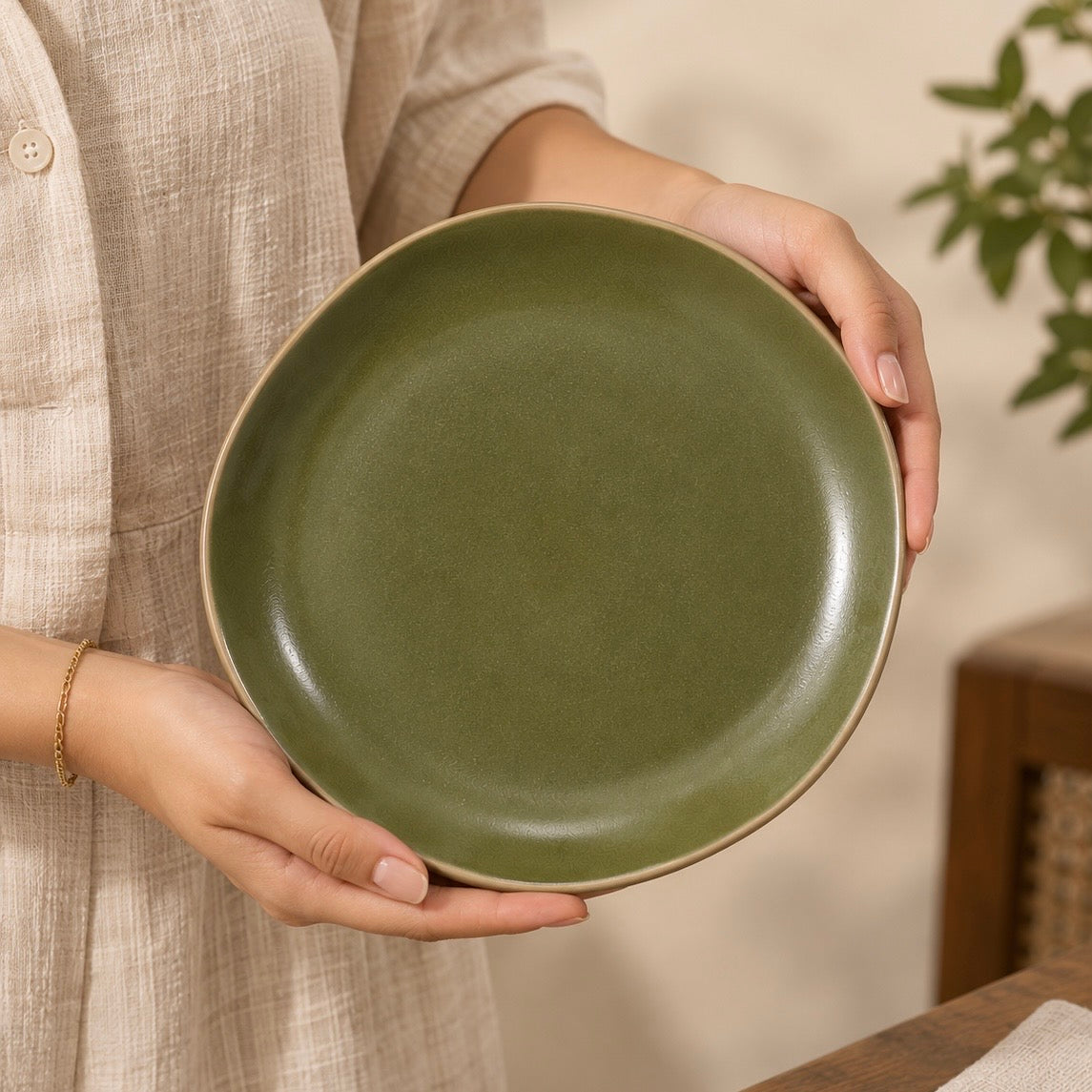 Moss green ceramic plates in Small and Dinner sizes by OZAY Living