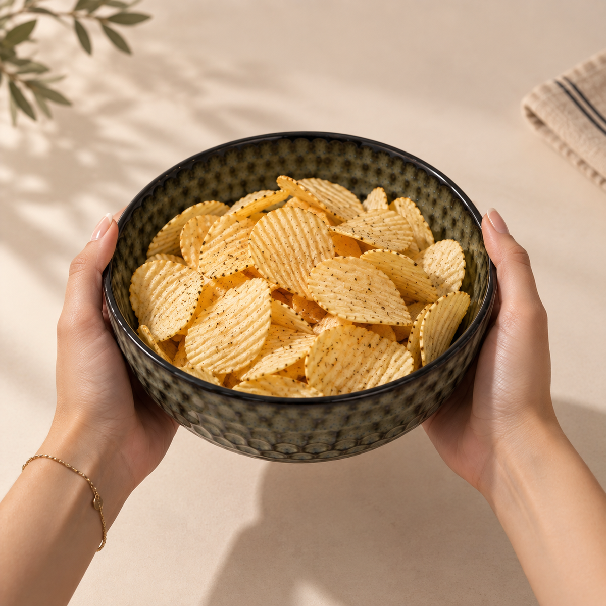 Pebble ceramic serving bowl with textured earthy finish by OZAY Living