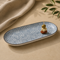 Sakura floral ceramic serving platter styled with an olive cheese and tomato skewer by OZAY Living.