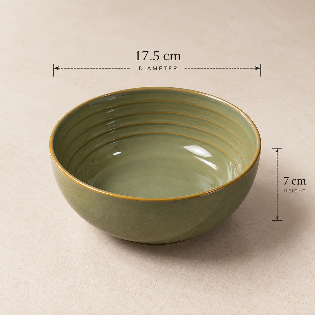 An olive green Grove Serving Bowl by OZAY Living with gold-toned ridges and rim, shown on a beige background with dimension overlays indicating a diameter of 17.5 cm and height of 7 cm.
