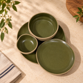 Moss green dining set with plates, katoris and serving bowl by OZAY Living