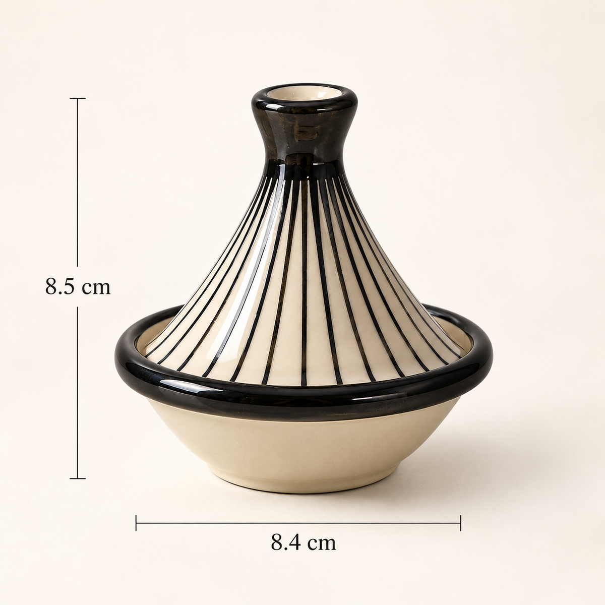 Two Ceramic Noor Petite Servers  with a cream-colored glazed body and black rim, featuring black radial stripes on the conical lid. Dimension lines indicate a height of 8.