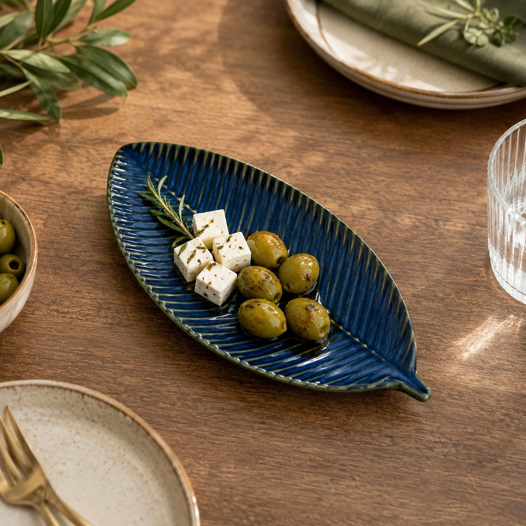 Patra ceramic serving platter with leaf-inspired design and blue glaze by OZAY Living
