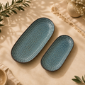 OZAY Living Pebble ceramic serving platters with textured blue pebble pattern

