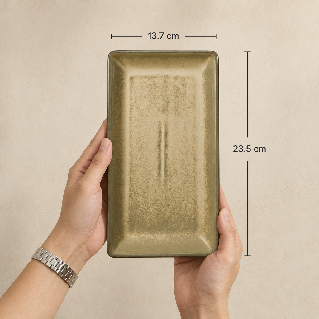 
Sand Stone Serving Platter by OZAY Living shown in hand with dimensions of 23.5 cm length and 13.7 cm width