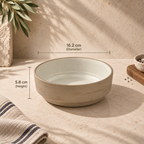 Siena Ceramic Serving Bowl with a textured beige exterior and a glossy off-white interior, shown on a stone surface with dimension overlays indicating a diameter of 16.2 cm and height of 5.